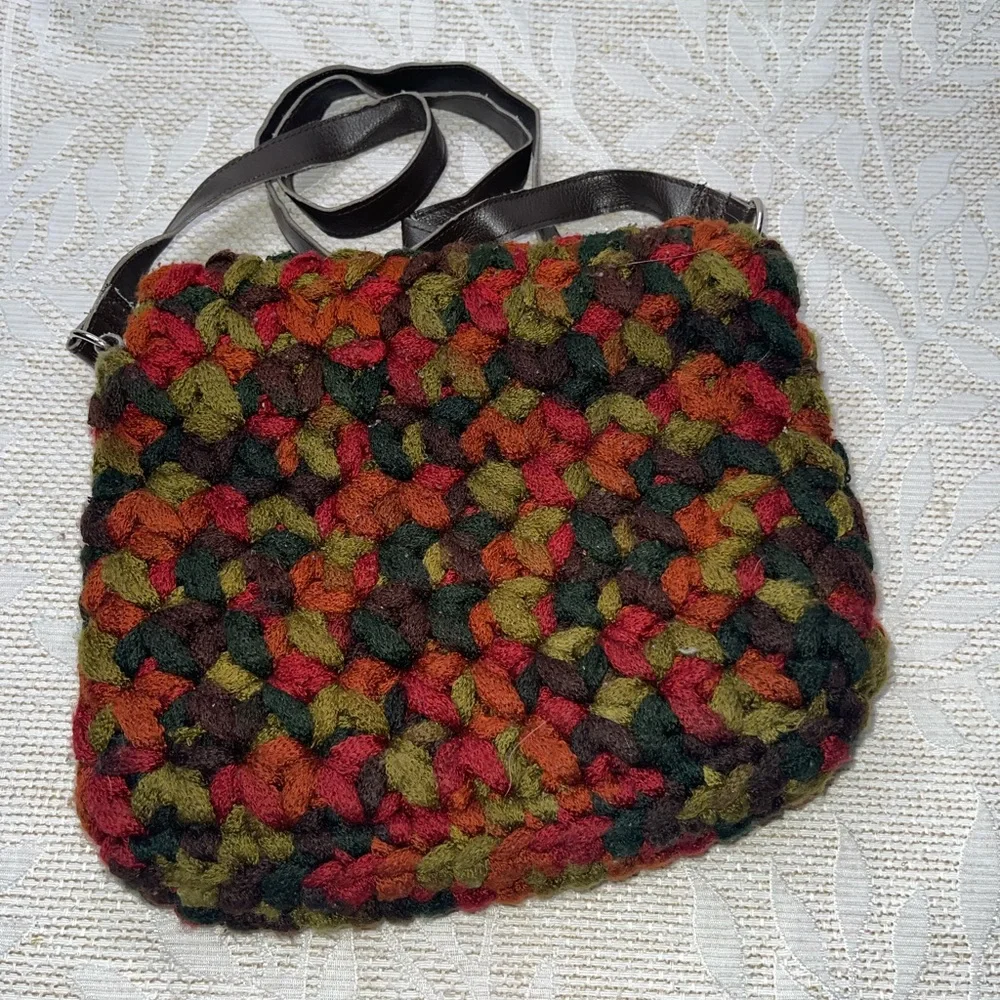 crossbody bag made with funky chunky, variegated yarn toggle closure
